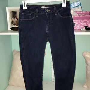 super skinny mid rise dark blue Levi’s
